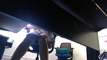 Young Colleague Under Desk Legs and Upskirt